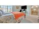 Spacious main bedroom featuring a sitting area, office space, and plenty of natural light from the window at 13534 Alberta Ave, Port Charlotte, FL 33981