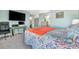 Spacious main bedroom with an office space and plenty of natural light from the window at 13534 Alberta Ave, Port Charlotte, FL 33981
