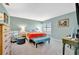 Spacious main bedroom with a sitting area and lots of natural light from the window at 13534 Alberta Ave, Port Charlotte, FL 33981