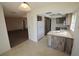 Well-lit kitchen with wooden cabinets and plenty of counter space at 1602 Jim Jim Ct, Venice, FL 34293