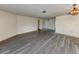 View of the spacious living room showing the double-door entry and light fixture at 1602 Jim Jim Ct, Venice, FL 34293
