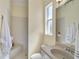 Clean bathroom featuring a vanity, shower, and neutral color palette at 1662 Bobcat Trl, North Port, FL 34288
