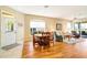 Cozy living and dining area with hardwood floors and natural light at 1683 San Silvestro Dr, Venice, FL 34285