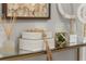 Close up on the console table with decorative objects in vase and boxes at 16848 Cayo Key Dr, Port Charlotte, FL 33953