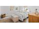 Cozy bedroom featuring a king-size bed, neutral tones, and unique decor at 1785 Bayshore Dr, Englewood, FL 34223