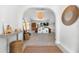 Stylish entryway leading into a bright living space with modern decor, natural textures, and an open floor plan at 1785 Bayshore Dr, Englewood, FL 34223