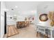 Bright, open kitchen featuring a large island with seating and modern decor at 1785 Bayshore Dr, Englewood, FL 34223
