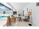 Stylish outdoor area featuring a pool, comfortable seating, and modern design at 1785 Bayshore Dr, Englewood, FL 34223