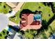 Aerial view of the property with a private pool and tile roof at 1886 Killdeer Ct, Venice, FL 34293