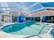 Large screened in pool with plenty of seating and outdoor dining areas at 1886 Killdeer Ct, Venice, FL 34293