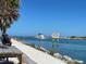 Scenic waterfront view with boats sailing on the water and people enjoying the waterfront scenery at 1886 Killdeer Ct, Venice, FL 34293