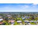 An aerial view showing the home and other properties, in a neighborhood near the coast at 201 Cavallini Dr, Nokomis, FL 34275