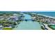 A picturesque aerial view of a coastal community with a bridge over a river, showcasing the area's beauty at 201 Cavallini Dr, Nokomis, FL 34275