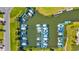 An aerial view of a boat dockage and neighborhood streets with waterway access at 201 Cavallini Dr, Nokomis, FL 34275