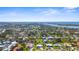 This aerial view showcases the neighborhood and location of the home relative to coastline at 201 Cavallini Dr, Nokomis, FL 34275