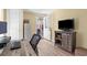 Bright office with wood-look floors and a ceiling fan at 201 Cavallini Dr, Nokomis, FL 34275