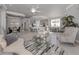 Expansive living space with neutral tones and views of the kitchen and dining area at 206 Bella Vista Ter # 29A, Nokomis, FL 34275
