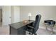 Another view of the office area with desk, office chair, printer and two closets in the room at 20794 Valprato Ct, Venice, FL 34293