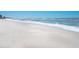 Image showcases a sandy beach and the ocean at 2110 Casey Key Rd, Nokomis, FL 34275