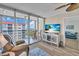 Bright living room with sliding glass doors to a balcony with ocean view at 232 Saint Augustine Ave # 802, Venice, FL 34285