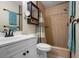 Bathroom with a shower, a white vanity and a towel rack at 308 Purdue Rd, Venice, FL 34293