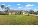 Attractive single-story home boasts well-maintained front yard and attached one car garage at 308 Purdue Rd, Venice, FL 34293