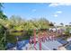 The dock and canal offer relaxation and recreation, with lush natural landscaping providing a peaceful backdrop at 31 Ramblewood St, Port Charlotte, FL 33953