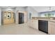 Open kitchen featuring stainless appliances, stylish countertops and open layout at 3447 Nadasky Ave, North Port, FL 34288