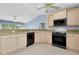 Modern kitchen with stainless appliances, sleek cabinetry, and an open layout at 3447 Nadasky Ave, North Port, FL 34288