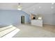 Spacious living room featuring bright light, high ceilings, and an open floor plan at 3447 Nadasky Ave, North Port, FL 34288