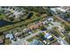 Aerial view showcasing the community, including homes, waterways, and landscaping at 358 Pineview Dr, Venice, FL 34293