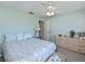 Bedroom featuring comfortable décor, neutral walls, and a light-filled atmosphere at 358 Pineview Dr, Venice, FL 34293