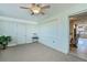 This bonus room is brightly lit and opens to the interior of the home at 358 Pineview Dr, Venice, FL 34293