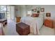 Cozy bedroom with a comfy bed, ample storage, and a view of the outdoors at 418 Cerromar Ct # 261, Venice, FL 34293