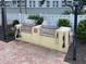 Outdoor grilling station area with stainless steel grills and brick patio, perfect for entertaining at 418 Cerromar Ct # 261, Venice, FL 34293