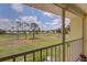 Screened in lanai with expansive views of the lush green golf course at 418 Cerromar Ct # 261, Venice, FL 34293