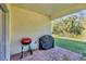 Outdoor patio with a grill, ideal for barbecues and enjoying the beautiful backyard at 4324 Knowles Ln, North Port, FL 34288