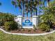 Welcome to Farmington Vistas! The community sign is surrounded by manicured landscaping at 435 Cerromar Ln # 326, Venice, FL 34293