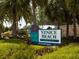 Venice Beach sign surrounded by lush greenery, promoting the Sarasota County Parks & Recreation Department at 435 Cerromar Ln # 326, Venice, FL 34293