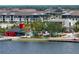 Modern community features apartments, a playground, and waterfront access at 456 Pinewood Lake Dr, Venice, FL 34285