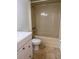 Beige bathroom with standard fixtures and toilet at 460 Base E Ave # 129, Venice, FL 34285