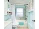 Inviting bathroom showcases a shower-tub combination, vanity with sink, and ample storage at 483 Circlewood Dr # O14, Venice, FL 34293