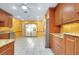 Eat-in kitchen features stainless steel appliances, granite countertops, and sliding glass doors at 49 Sandstone Cir, Venice, FL 34293