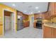 Bright eat-in kitchen featuring stainless steel appliances and granite countertops at 49 Sandstone Cir, Venice, FL 34293