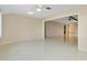 Bright living room with pristine tile flooring at 49 Sandstone Cir, Venice, FL 34293