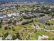 Enjoy the serene community view showcasing lush landscaping, lakes, and golf courses, perfect for outdoor recreation at 503 Clubside Cir # 47, Venice, FL 34293