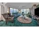 Cozy living room with plenty of seating and natural light at 503 Clubside Cir # 47, Venice, FL 34293