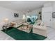Bright living room with views to a sunny lanai at 503 Clubside Cir # 47, Venice, FL 34293