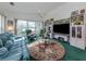 Inviting living room with large windows and lots of light at 503 Clubside Cir # 47, Venice, FL 34293