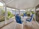 Patio featuring outdoor dining area overlooking garden with surrounding landscaping at 503 Clubside Cir # 47, Venice, FL 34293